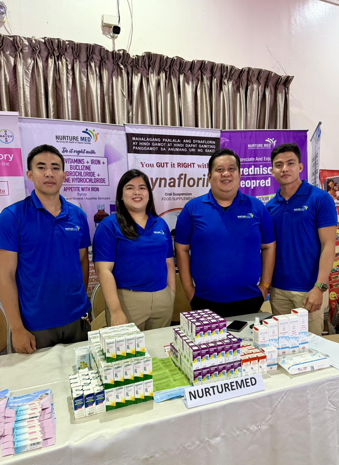 Nurturemed representatives behind a product display at the Zamboanga City Medical Center pediatrics scientific symposium